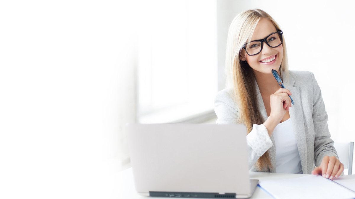 A person working at a laptop from home, used as a decorative image for distributed work
